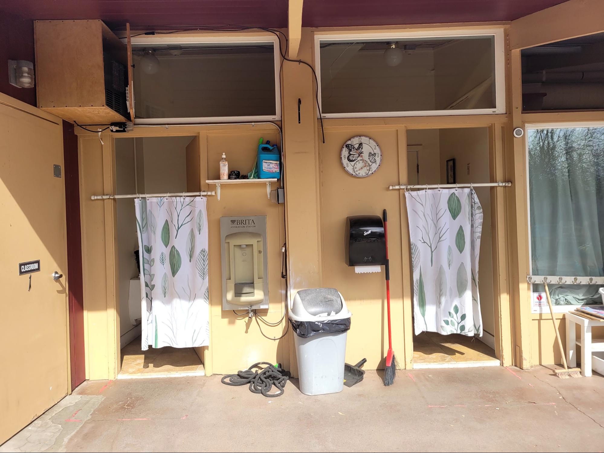 Outdoor child-sized rest room and toilet with filtered water system